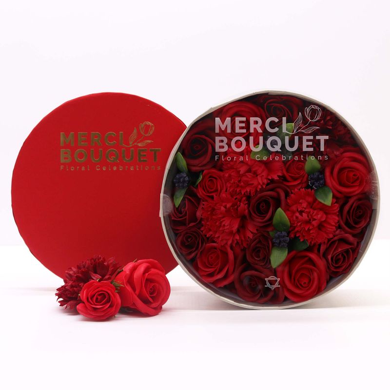 Runde Box – klassische rote Rosen