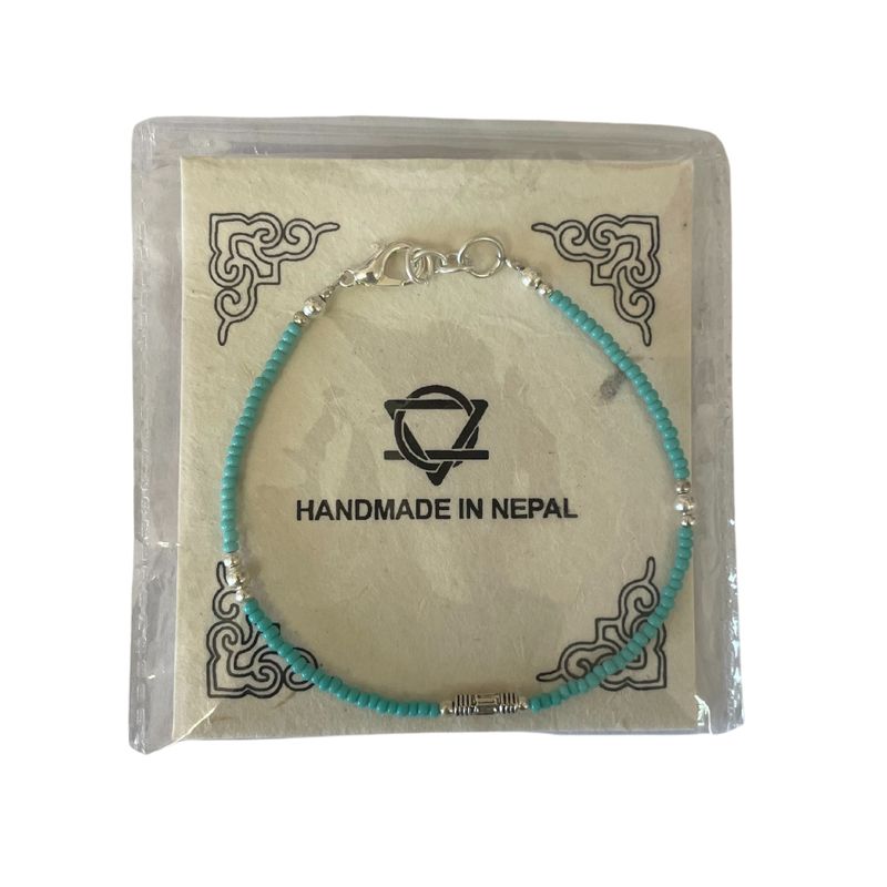 Nepalesisches Armband mit extrafeinen Edelsteinen – Türkis und Tropfenform